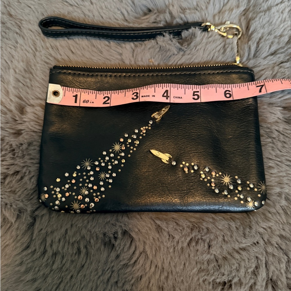 Fossil Black Wristlet with Star & Rocket Design